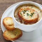 Tomato basil soup in a bowl with toast