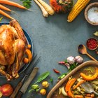 Preparing roast chicken with herbs and vegetables