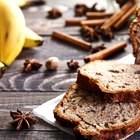 Peeled banana on a wooden board