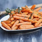 Honey glazed baby carrots with parsley.