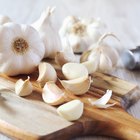 Fresh garlic on wooden background