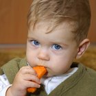 Hungry baby in highchair waiting to be fed