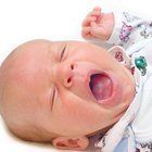 Close up of a mother feeding her child