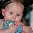 Baby chewing on teething ring