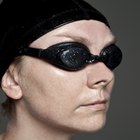 Woman Wearing a Swim Cap and Goggles