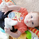 Infant Boy Playing with Toys