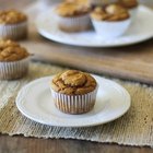 Pieces of muffins with stuffed and with chocolate in plate