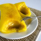 Yellow summer squash on display in baskets