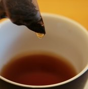 Drink herbal tea with a little sweetener to help dry cough.
