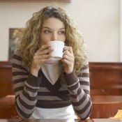 Woman sipping hot tea