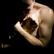 Torn rotator cuffs cause pain when lifting heavy objects.