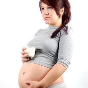 The rapid growth of pregnancy often causes painful stretch marks.