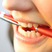 Avoid putting sharp objects inside your mouth that could infect your cold sore.