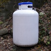 Propane tanks must be constructed with specific components to meet national standards.