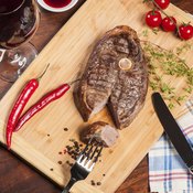 Cooked steak on table cutting board