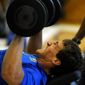 Dumbbell presses can assist your bench press.