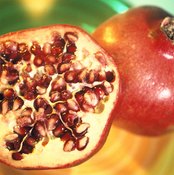 The seeds are enclosed by juice-filled sacs.