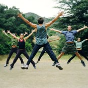 Jumping jacks are often used in aerobic classes to keep the heart rate up.