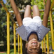 Using a yoga hammock will remind you of swinging on monkey bars.