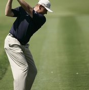 Ernie Els' hands and elbows form a triangle during his backswing.