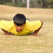 Push-ups are a good way for children to build muscle.