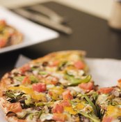 Slices of pizza on the counter.