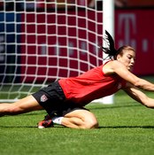 U.S. women's goalkeeper Hope Solo practices a diving save.