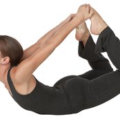 Use your abdominal muscles to lift your chest in bow pose.