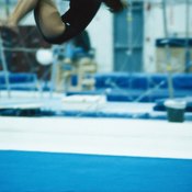 A gymnast relies on anaerobic energy stores for tumbling passes on the floor routine.