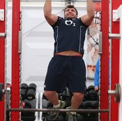 Perform neutral grip pull-ups with your hands turned inward.
