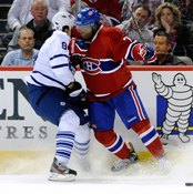 Montreal's P.K. Subban, right, leads with his shoulder to lay a clean hit onto Toronto's Mikhail Grabovski.