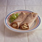 Peanut butter and banana tortillas make a healthy, protein-rich snack.