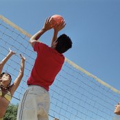 Blocking a spike isn't considered a hit in volleyball.