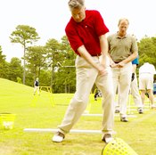Choking up on your pitching wedge is an effective practice technique.
