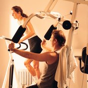 Most gyms provide a machine that allows you to bench press while sitting.