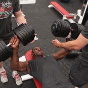 Dumbbell bench presses allow you to use a more natural range of motion.