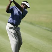 With his left shoulder tucked under his chin and his right elbow bent at 90 degrees, Vijay Singh has made a full shoulder turn.