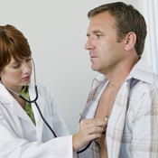 A man has his heart checked by a doctor.
