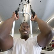 Gym pulley machines can be used for both arms and legs, but the ankle strap is typically used for leg exercises.