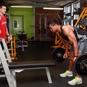 Include rack pulls and deadlifts in your program for best results.