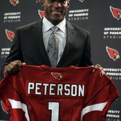 Patrick Peterson shows off the jCardinals ersey representing his 2011 selection as the No. 5 overall pick.