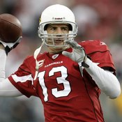 Arizona quarterback Kurt Warner prepares to throw during a 2010 playoff game.