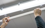 How Does the Condenser in a Fluorescent Lamp Work?