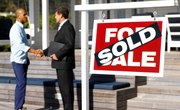 Can a Bank Short-Sale a House With Liens on the Title?