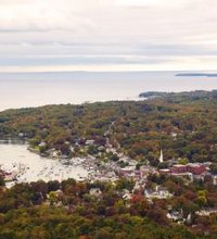 Villages in New England are nothing if not reliably quaint and lovely. Whether by the seashore, in the mountains or amid orchards and dairy farms, ...
