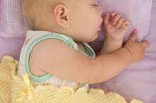 My Baby Coughs & Seems to Choke on Saliva During Sleep