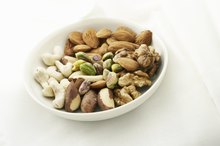 What Vitamins & Minerals Do Nuts Contain?