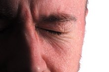 What Are the Causes of Headaches & Sweating?
