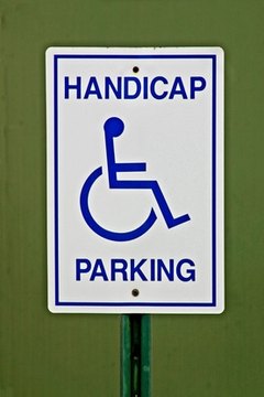 Handicapped signs are found in parking lots.
