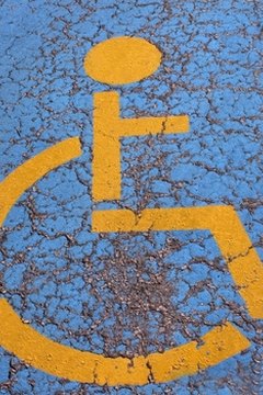 Handicapped parking space are marked on the pavement.